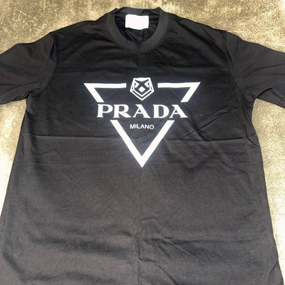Prada T-shirt is original the quality is heavy u buy it u can see I wear it ones